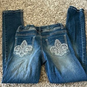 Faded glory girls size 10 with rhinestone detail butt pocket and front button.